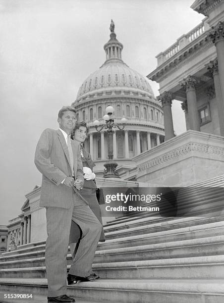 Senator and Mrs. John F, Kennedy are shown at the capitol as the Massachusetts democrat returned to Washington today after long weeks of recuperation...