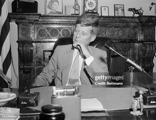 Senator John F. Kennedy, Mass., is shown as he met with newsman at the Capitol today after long weeks of Re cooperation from a serious spinal...