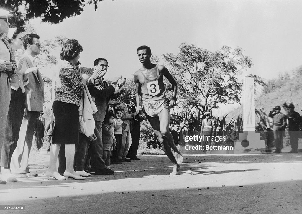 Abebe Bikilla Running in Marathon