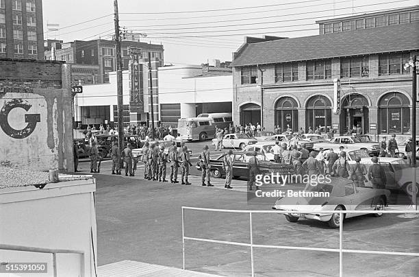 Montgomery, Alabama: "Freedom Riders" Leave Alabama. This general view shows Trailways bus with "Freedom Riders" aboard leaving the bus terminal with...
