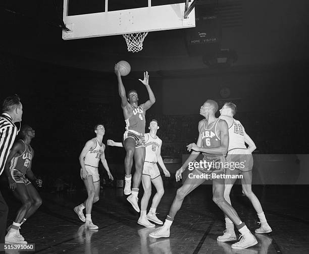 Kansas City, Missouri: K.C. Jones of the University of San Francisco, takes a shot in the Dons' semifinal game with Colorado. USF won, 62-50, and...