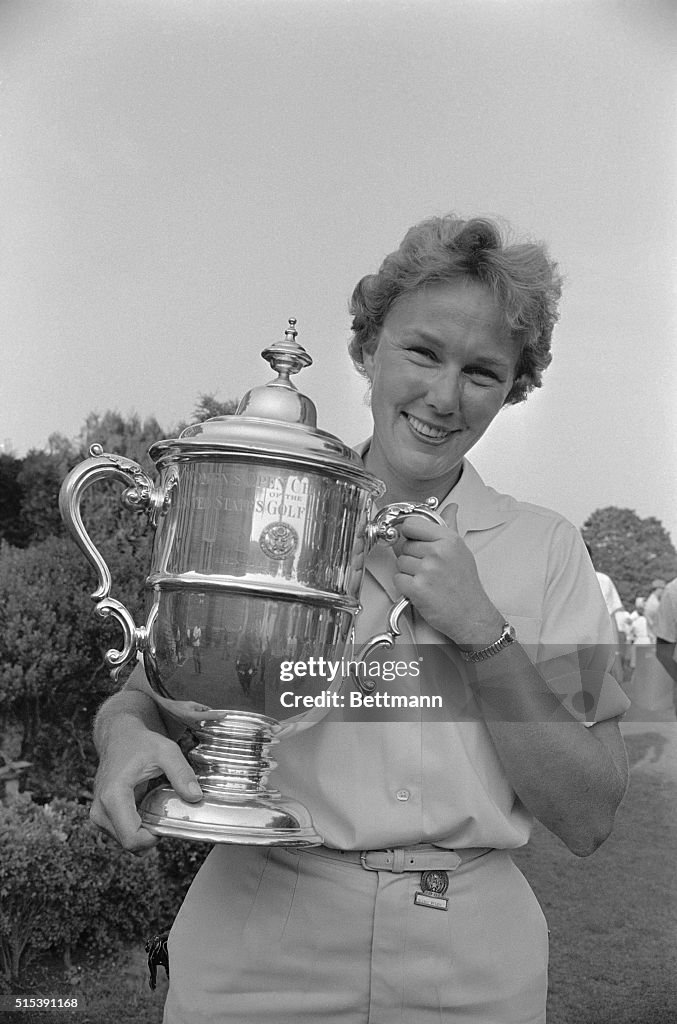 US Women's Open Golf Champion Mickey Wright Holding Trophy