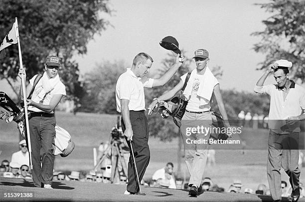 Birmingham, Mich.: Gene Littler doffs his hat to crowd after sinking a 2-foot putt on 18th hole to win 4th and final round of U.S. Open at Oakland...