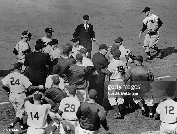 Jackie Robinson of the Dodgers was involved in a couple of collisions which led to a couple of hassles today as the Brooks and Giants clashed at...