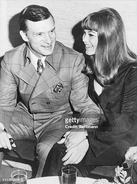 Getting to Know You. Rome, Italy: Playboy publisher, Hugh Hefner, and owner of the scores of Playboy clubs, poses with his friend Barbara Benton, 19...