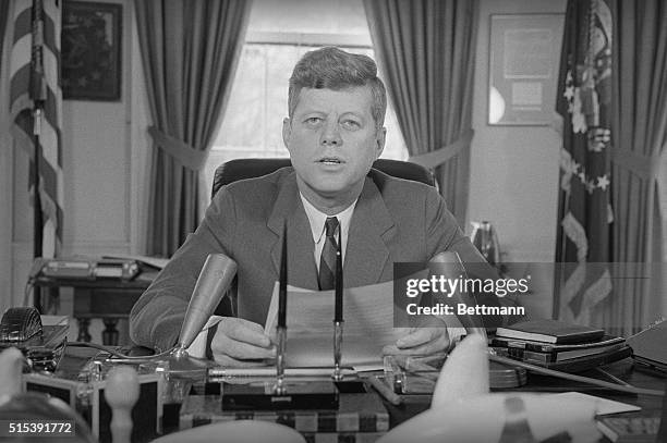 President John F. Kennedy today broadcasts a message of American ideals overseas in a brief message highlighting the opening of a new voice of...