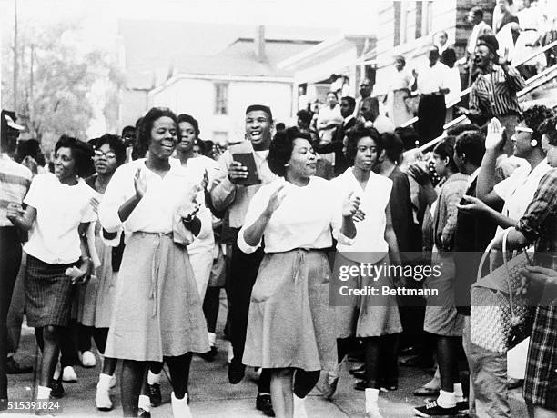 Teenagers in Birmingham begin a segregation protest march that ended in their being routed by high-pressure hoses and snapping police dogs.