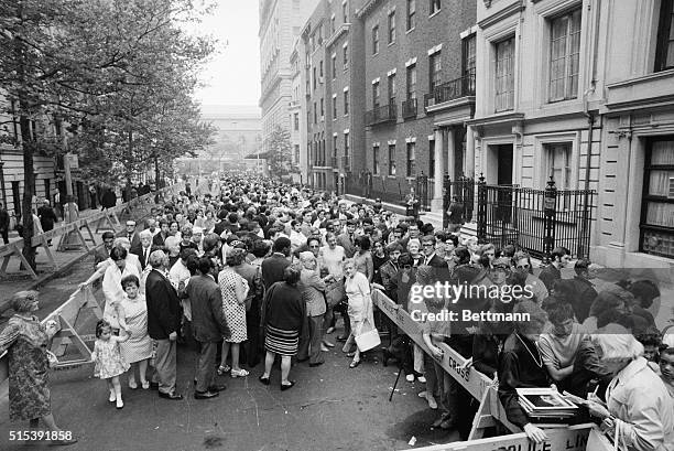Crowd of people outside of Judy Garland's funeral services in New York City.