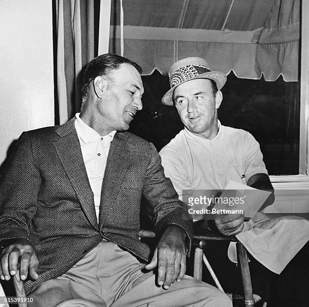 Sam Snead, right, shows his card to Ben Hogan after third round play in the Sam Snead $10,000 Festival open-golf tournament on the Greenbriar course,...