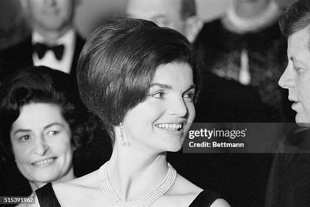 Mrs. Jacqueline Kennedy wore this fancy hairdo at the state dinner she and President Kennedy gave at the White House late February 19th for visiting...