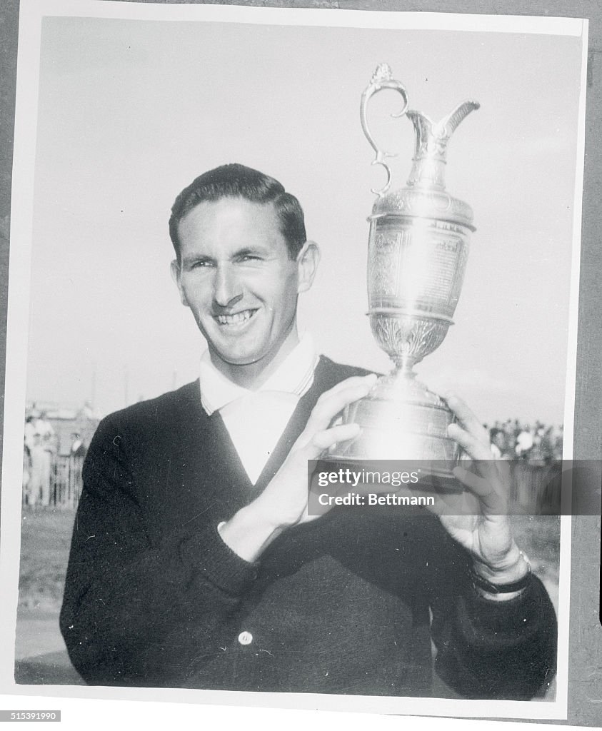 Bob Charles Holding Trophy