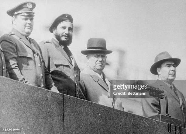 Left to right on the stand of the Lenin Mausoleum in Moscow's Red Square, watching the May Day procession pass by are: E. Navarro, Marshal...