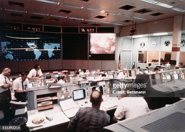 Space Center, Houston, TX- Overall view of activity in Mission Operations Control Room in the Mission Control Center, Building 30, on the second day...
