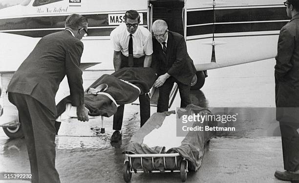 Scranton, PA: The body of Mary Jo Kopechne, former employee of the late Sen. Robert F. Kennedy, is removed from a charter plane at...