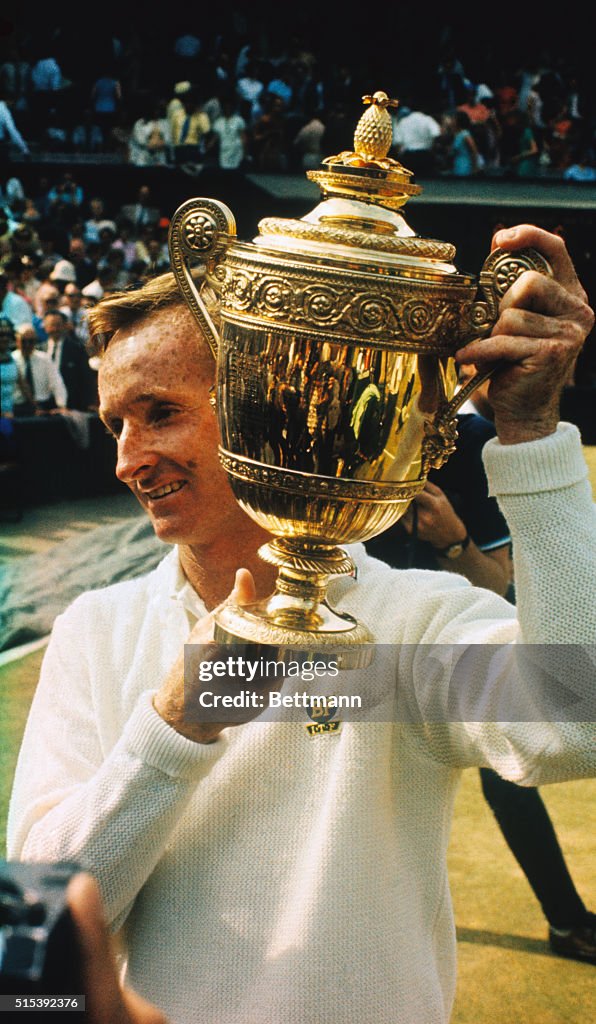 Rod Laver Smiling as He Holds Gold Cup