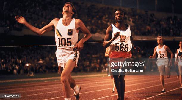 Mexico City, Mexico: Australia's Ralph Doubell winning the men's 800 meter run in the 1968 Olympics. Wilson Kiprugut of Kenya is second.
