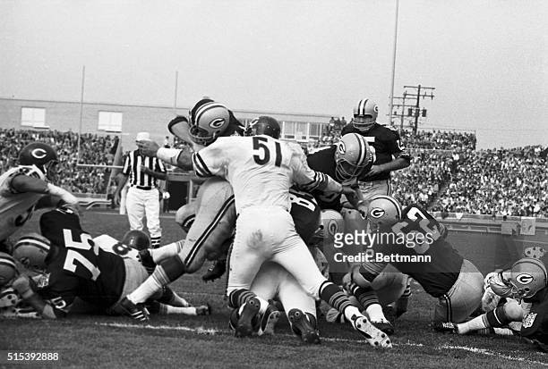 Green Bay Packer Travis Williams is stopped on the one-yard line in the third quarter by Chicago Bears linebacker Dick Butkus during the...