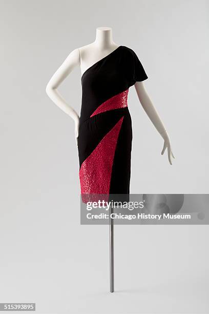 One-shouldered cocktail dress, designed by Karl Lagerfeld for Chloe, with red sequined triangular insets, 1982. Shown as part of the Chicago History...