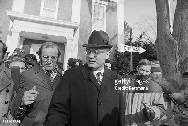Edgartown, Mass.: District Attorney Edmund S. Dinis is followed by newsmen as he leaves Dukes County Courthouse after the second day of proceedings...