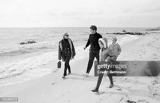 Sen. Edward M. Kennedy, wife Joan, and children Edward Jr. And Kara walk along beach from the home to the Kennedy compound. Joseph P. Kennedy,...