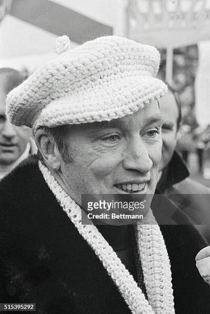Canada's Prime Minister Pierre Elliot Trudeau, showed fine form in both his fashion and football kicking at the Grey Cup Game. Neatly attired in...