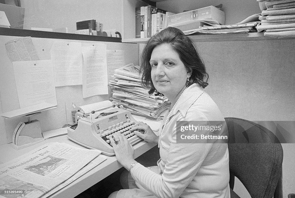 Helen Thomas Sitting at Her Typewriter