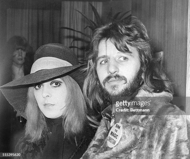 Ringo and wife head for States...Beatle drummer Ringo Starr and his wife, Maureen, pause at London's Heathrow Airport January 26th before boarding a...