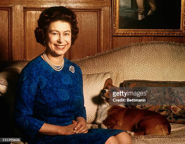 Sandringham, Norfolk, England, UK: Britain's Queen Elizabeth II smiles radiantly during a picture-taking session in the salon at Sandringham House....