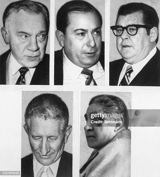 February 12, 1970: Aniello Dellacroce, Mafia figure, handcuffed holding a ciggarette with four other men escorting him.