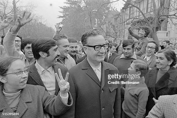 Surrounded by supporters, Dr. Salvadore Allende, arrives at a polling station on September 4th to cast his vote in the Presidential election....