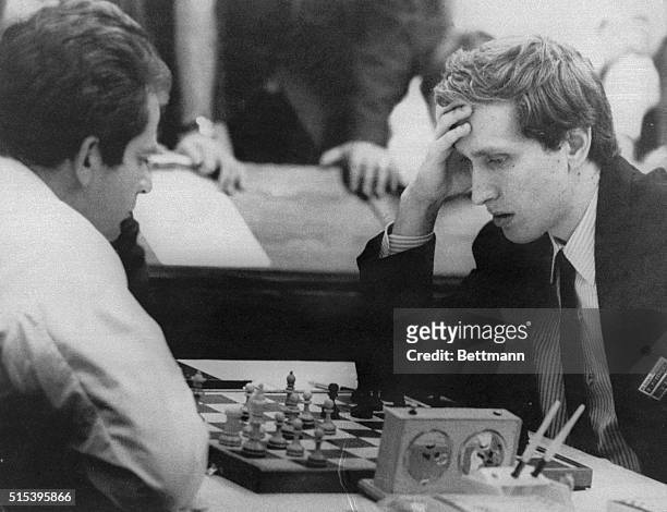 Bobby Fischer , an eight-time U.S. Chess champion, ponders his next move against world champion Boris Spassky in the sixth round of the 19th chess...