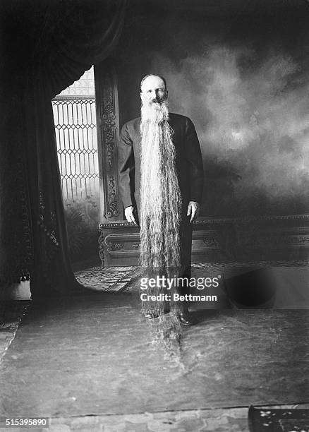 Here is the longest beard in the world, for it has been growing for 41 years. By the beards of the prophets, this is some beard. Since 1881 it has...