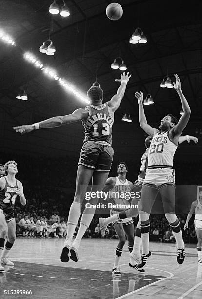 Milwaukee: Lew Alcindor, Milwaukee Bucks sneaked in front of Los Angeles Lakers Wilt Chamberlain for a layup during the Bucks-Lakers game December...