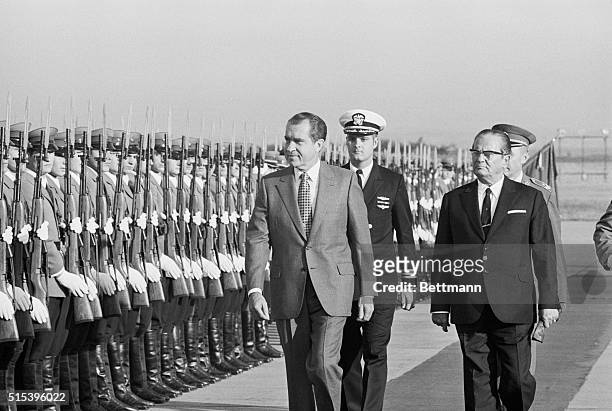 President Richard Nixon is escorted by Yugoslav President Josip Broz Tito as Nixon reviews the honor guard upon arrival in Belgrade, September 30th.