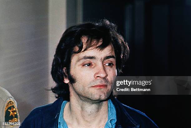 Charles Manson who led a cult that committed murders in Los Angeles in the sixties is clean shaven in closeup photo.