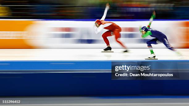 Artur Was of Poland and Kai Verbij of The Netherlands competes in the mens 500m race during day three of the ISU World Cup Speed Skating Finals held...