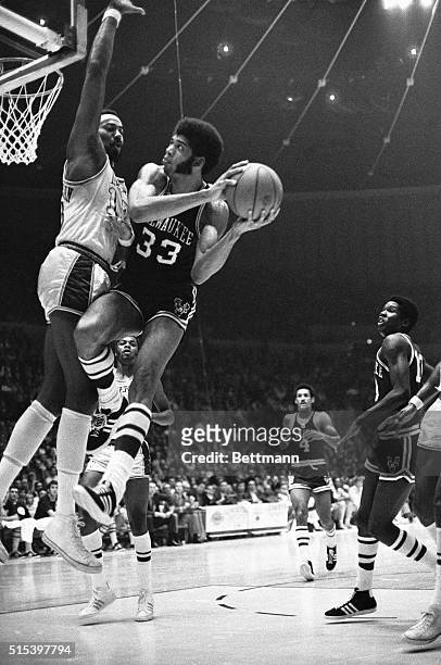 Inglewood, CA- Milwaukee Bucks center Lew Alcindor goes to the basket as his Los Angeles Lakers counterpart, Wilt Chamberlain , attempts to block his...
