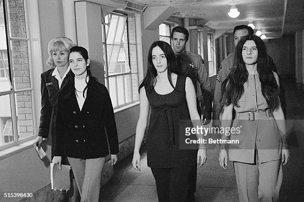 The three female defendants in the Tate-LaBianca murders, , Leslie Van Houten, Susan Atkins, and Patricia Krenwinkel, return to their cells.