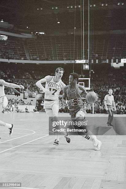 Hal Greer, of the Philadelphia 76ers drives past John Havlicek of the Boston Celtics during the 1st quarter action at Boston Gardens, as shown in...