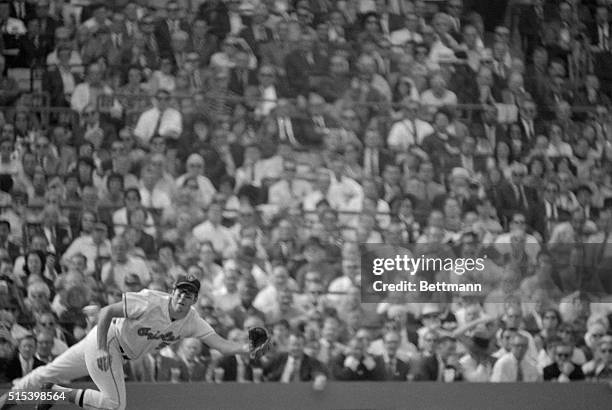 Oriole's third baseman Brooks Robinson makes a diving catch on Red's Johnny Bench's line drive in the 5th inning of the 3rd World Series game here....