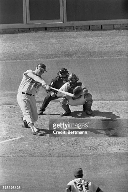 Orioles 1st baseman Boog Powell blasts a home run off Reds pitcher Gary Nolan scoring Paul Blair in the 4th inning. Catcher John Bench and umpire Ken...