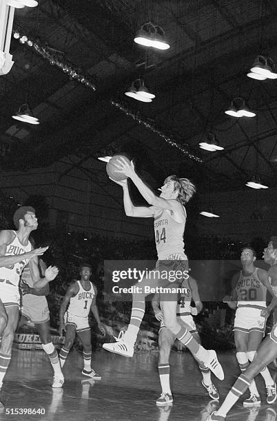 Star rookie Pete Maravich of the Atlanta Hawks in action against the Milwaukee Bucks.