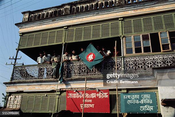 The flag of Bangladesh is raised at the Awami League headquarters in Chuadanga, East Pakistan during the the Bangladesh War of Independence, 11th...