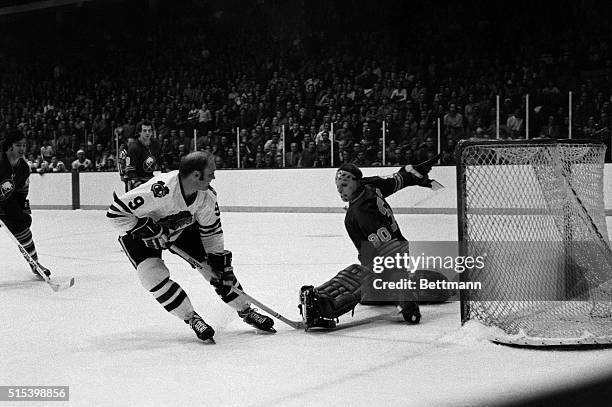 Black Hawks' goalie Bobby Hull scores on Buffalo's goalie Dave Dryden during second period action of their game 12/15. The Black Hawks won, 2-1.