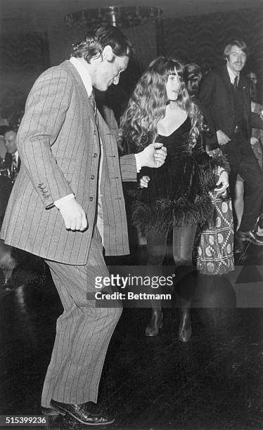 Taking Another Step. McAfee, New Jersey: Hugh Hefner, head of the Playboy "Empire," and Barbi Benton dance at a celebrity-studded party at Playboy's...