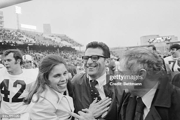 Penn State coach Joe Paterno, is congratulated by his wife Suzanne, and Pennsylvania Governor Milton Sharp, , as he leaves the field after Penn State...