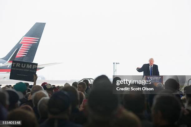 Republican presidential candidate Donald Trump speaks to guests gathered for a rally at the Central Illinois Regional Airport on March 13, 2016 in...