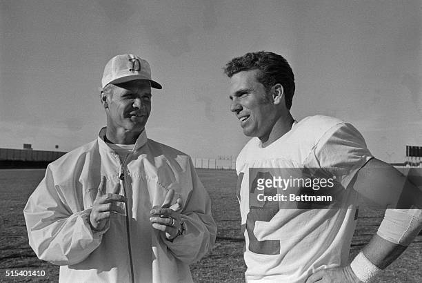 Cowboy coach Tom Landry, named former Heisman Trophy winner, and Roger Staubach, of the Cowboys, and No. 1 quarterback are shown here. The move by...