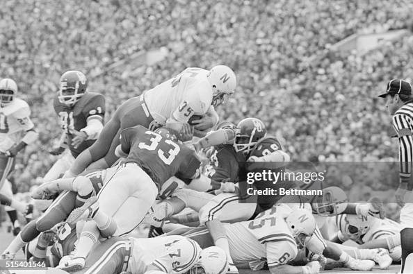 Nebraska's Players in Huddle During Football Game Nebraska's Players in Huddle During Football Game