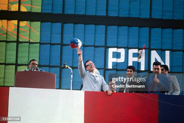 Santiago, Chile: President Salvador Allende of Chile speaks before a crowd assembled in Santiago's National stadium to celebrate the first...